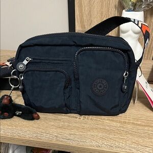 Kipling Navy Belt Bag with Patterned Strap